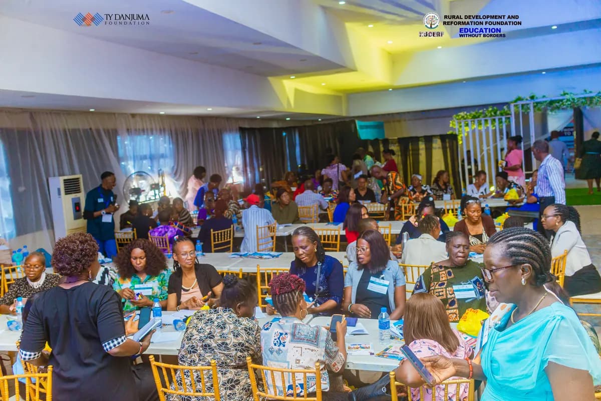 Impacta partners at a conference organized by impacta