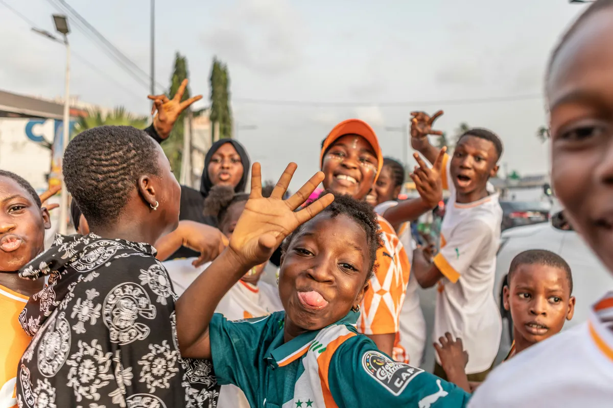 group of kids in a celebratory mood