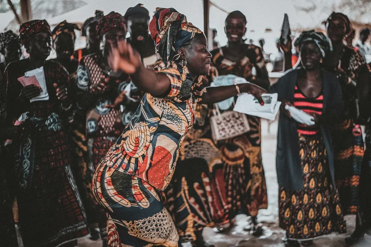 group of women dancing after an empowerment program