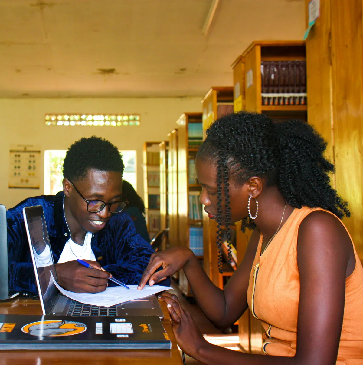 2 ruderf staffs working on a project