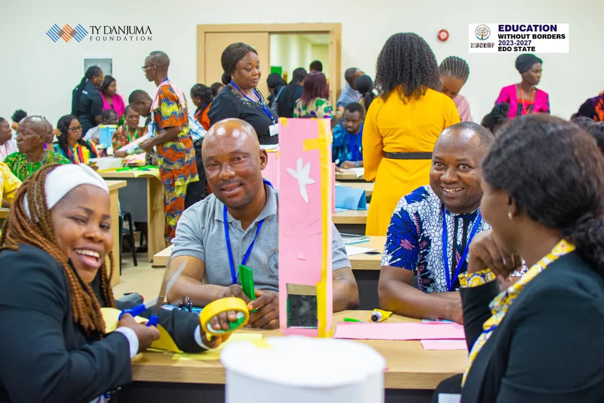 two ladies taking a picture at an even organized by impacta hub